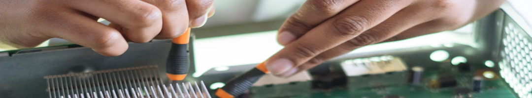 Tech repairing a computer